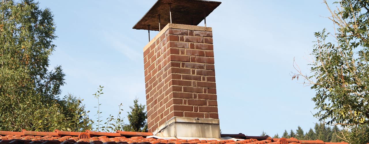 reparation cheminee de toiture | NET TOITURE 77 | Votre spécialiste de la couverture de toit 77 et de la rénovation 77 en Seine-et-Marne